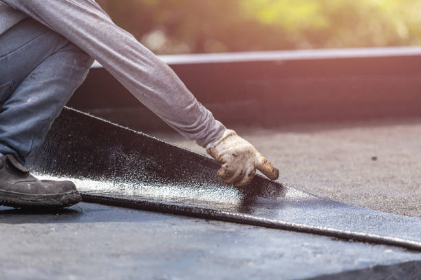 Professional Waterproofing technician working in Grand Bay, AL